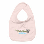 “Experte en bavouilles” — Bavoir bébé - face_rose